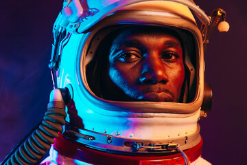 Cinematic image of an astronaut. Young spaceman preparing to go to the moon and mars . Concept...