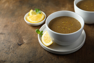 Traditional homemade lentil soup with lemon