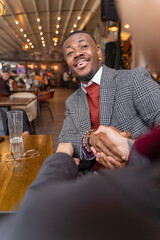 Making a deal for business partnership while sitting in the cafe