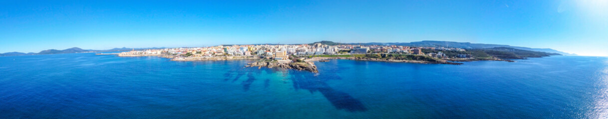 Panoramic view of Alghero shore on a sunny day