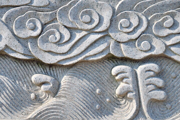 Close-up of traditional stone carving patterns in ancient Chinese architecture