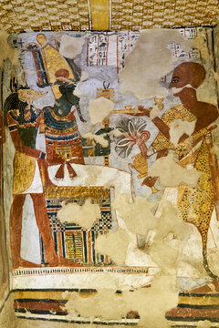 Colourful mural from Theban tomb TT31 of Khonsu, depicting Osiris on a throne, Anubis and a sem-priest in leopard skin