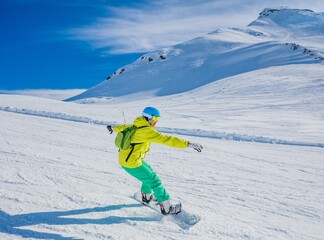 Girl snowboarder enjoys the winter ski resort.