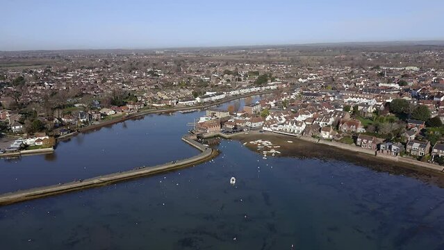 Emsworth in the South of England aerial view of the estuary and small boats with seabirds on the water.