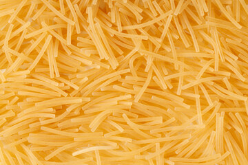 chopped raw noodles close-up. pasta