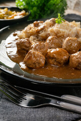 Minced meat balls in mushroom sauce.