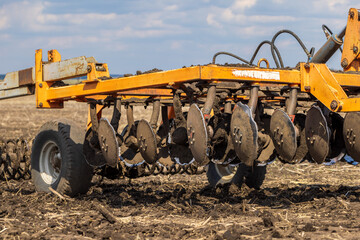 Tractor Plowing Field and Tillage. Agricultural land and Farm. Agriculture. Preparing the soil for...