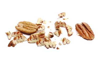 Pecan nut chopped isolated on white  