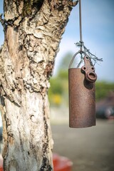 Rusty bell in a tree