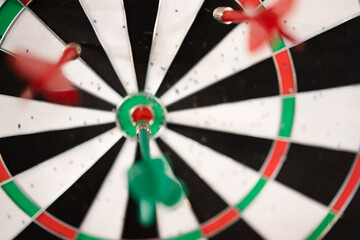 Close up view of dartboard with darts