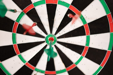 Close up view of dartboard with darts