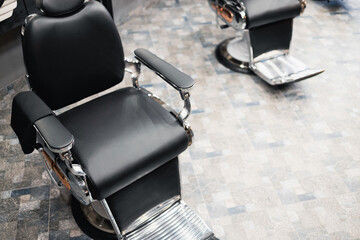 Empty chair at barber shop