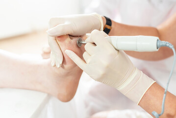 Beauty course training - leaning pedicure step by step. Training for pro nail technician, beauty expert. Practitioner training in pedicure, beauty salon. Nail Technician Instructor with her student.