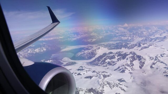 View From Airplane Window Over Alaska Glaciers