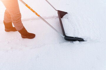 Service cleaning snow winter with shovel after snowstorm. Snow removal in wintertime. Working...
