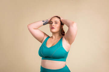 Plus size woman posing for body acceptance