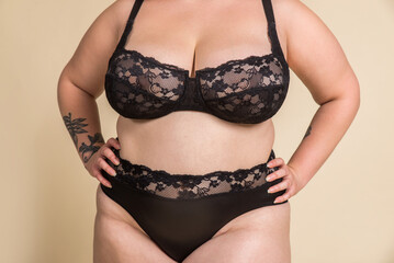 Plus size woman posing for body acceptance