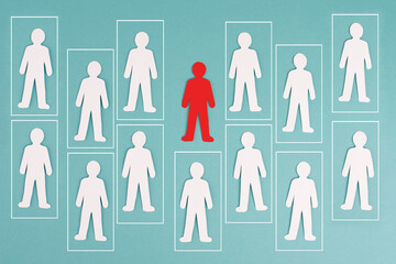 Think outside the box concept, standing out from the crowd, group of people in boxes, one red man has individuality - obrazy, fototapety, plakaty