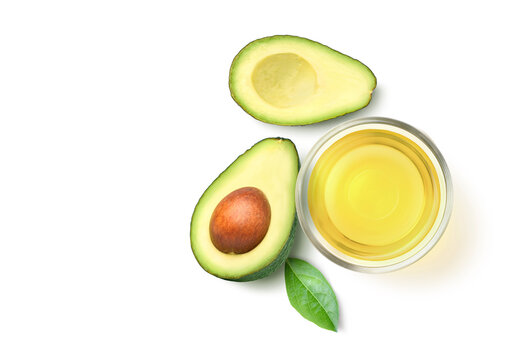 Flat lay of Avocado oil with avocado fruit  isolated on white background.