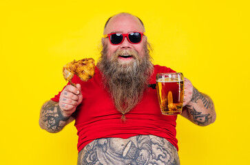 Man watching television while drinking and eating. Funny hipster man portrait on a colored...