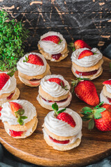 Mini Victoria sandwich cake. Sponge cake is a light cake made with egg whites, flour and sugar. Selective focus shot.
