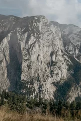 Fotobehang Blick auf Bergwand und Berglandschaft © Sarah