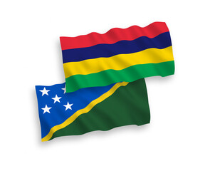 Flags of Solomon Islands and Republic of Mauritius on a white background