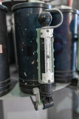 the paint tinting device is installed in the production hall. According to a given scheme, adds colorants to a container for mixing ingredients