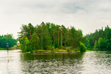 North Karelia lake, Russian wild nature. Forest growing on the stones