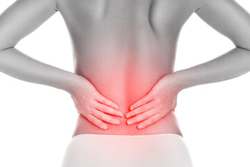 Young woman suffering from lower back pain