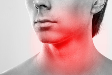 Man with a pain in his neck. Concepts of problems with thyroid or sore throat.