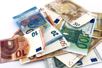 Obraz na płótnie Canvas Euro banknotes. Money. Pile of paper euro banknotes as part of the payment system of the united country 10 20 50 100. fifty and one hundred. euro cash background. Euro money banknotes. Background