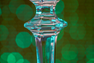 Glass made of crystal-like materials photographed in the studio with colorful background