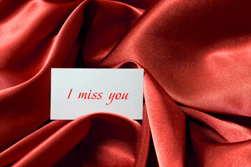 card with writing i miss you
