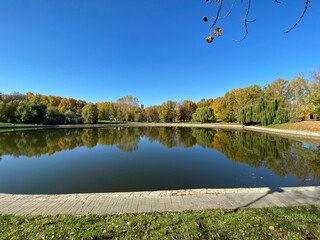 park in autumn at dry sunny fall day