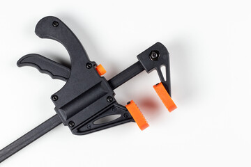 Modern bar clamp with quick release isolated white backgrgound.