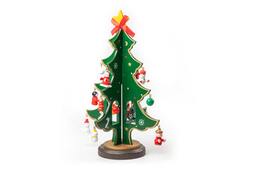 Miniature Model Winter Pine tree with snow is props decoration for create an atmosphere festival Christmas. isolated on white background.