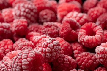 Frozen berries of raspberries, covered with hoarfrost. Close-up
