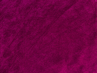 Purple magenta velvet fabric texture used as background. Empty purple fabric background of soft and smooth textile material. There is space for text...