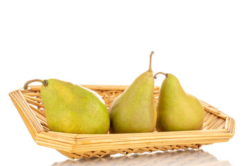 Three sweet juicy pears with straw dishes , macro, isolated on white background.