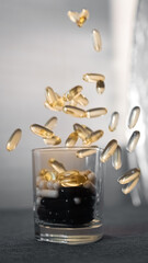 Vitamins and dietary supplements close-up. Macrophoto of capsules. Vitamins on the table.