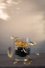 Vitamins and dietary supplements close-up. Macrophoto of capsules. Vitamins on the table.