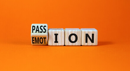 Passion or emotion symbol. Turned wooden cubes and changed the word Emotion to Passion. Beautiful orange table, orange background, copy space. Business, passion or emotion concept.