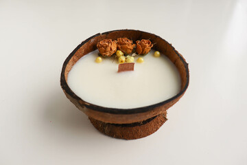 gift box with original handmade soy candle in coconut 