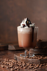 Coffee and chocolate cocktail with whipped cream.