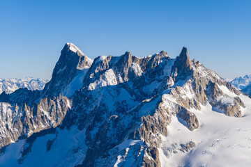 Aiguille Verte, Du Jardin, Les Drus and Les Droites in Europe, France, Rhone Alpes, Savoie, Alps, in winter on a sunny day.