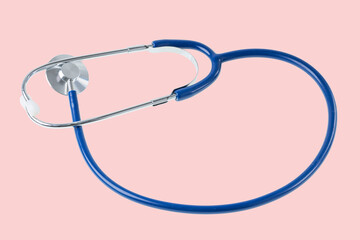 Close up view of medical professional stethoscope isolated on pink background.