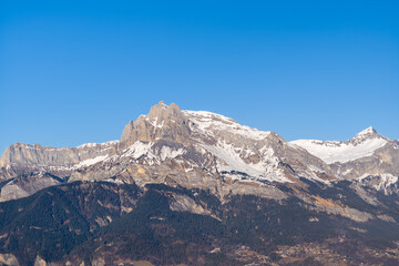 The panoramic view of Tete du Colonney, Aiguille Rouge and Varan in Europe, France, Rhone Alpes, Savoie, Alps, in winter on a sunny day.