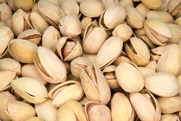 Roasted and salted Pistachio in shell, background image