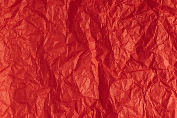 Bright red paper texture or background.